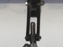 Coupler in tightened position, some length adjustment to the shackle end piece may be necessary as it would not be able to tighten down this far with a coupler hook in place. It may not have to tighten anywhere near this amount as the distance will determined by the how soon the buffers contact the other rail car's buffers. Experimentation will tell.