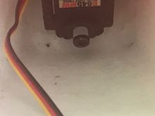 A close up of the clearance in the Nose gear bay