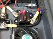 Press the red button to open the breaker.