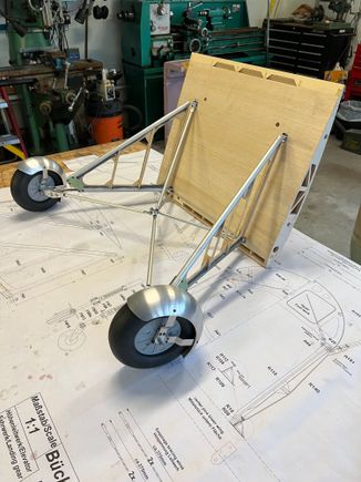 I temp screwed the fenders to the straps.  But they will ultimately be Hysol'd and pop riveted to the straps