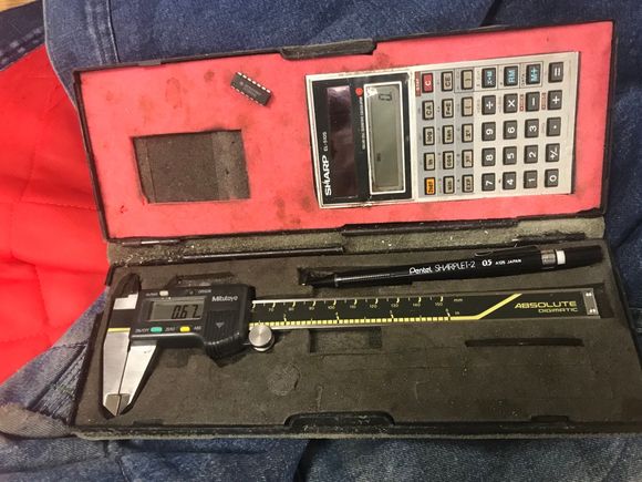 Added calculator in cover lid.  Pencil too 