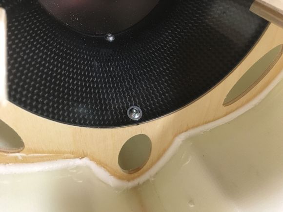 Glued a hardwood block to the back of the former. Used a #3 servo screw to hold the bell mouth tight to the former. 