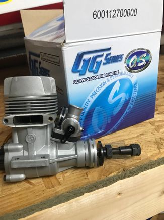 With original muffler and spinner adapter.