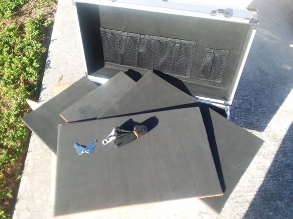 Here are the hard board panels that are the soft material covered foam for customizing the space.
Not the pocket in the lid for small items.