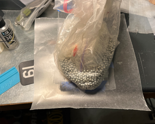 Some weight to hold the shape while curing.