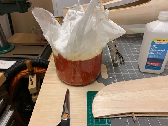 I used a 3/4 oz layer first, followed by 2 oz, 5 (two pieces - top and side), and one more 3/4 oz layer.  I'm not an expert at this, it's just what I'm used to using.