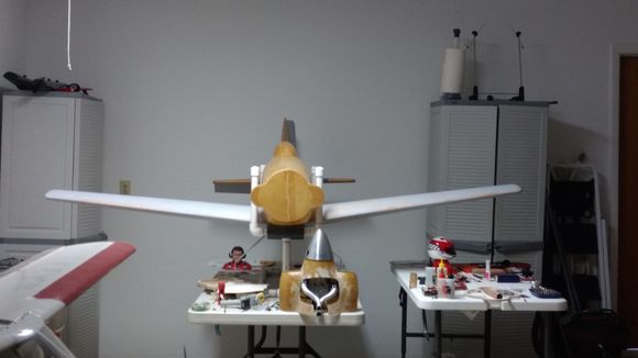 Notice GT 80 Zenoah Engine with pipes on right side of table