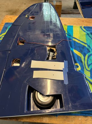 . . .then capturing the place they go through the door surface like this.  Note: they don't go thru the door 90 degrees so the holes get drilled at a slight angle.