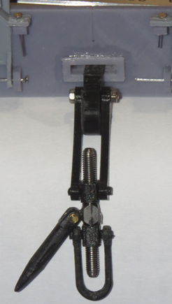 Coupler in tightened position, some length adjustment to the shackle end piece may be necessary as it would not be able to tighten down this far with a coupler hook in place. It may not have to tighten anywhere near this amount as the distance will determined by the how soon the buffers contact the other rail car's buffers. Experimentation will tell.