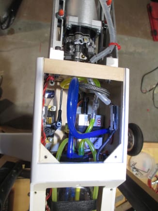 Inside view of where the ignition module, throttle servo and IBEC are located.