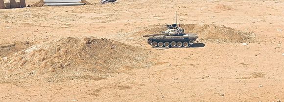 35ft away and maximum reliable range the new 6.0 IR receiver would register 360deg. hits with the sun shade attached. 