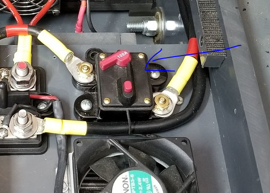 Press the red button to open the breaker.