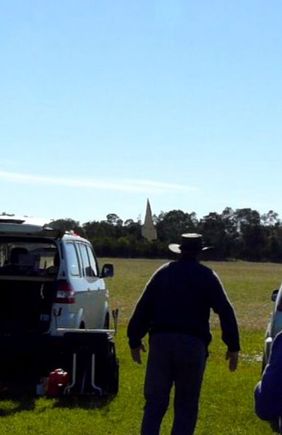 Hovering 15.5Kwatt "Triptych at 15.5 kilo AUW, just before slamming it down with minimal damage.