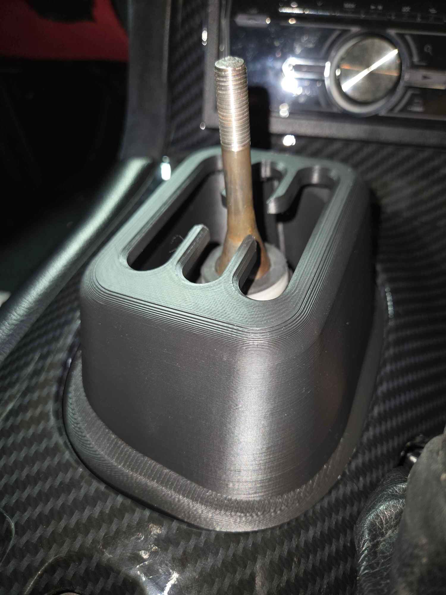 Im working on a gated trans adapter for the OEM Shifter, this photo is a few revisions old. The car is now in storage for the winter though, so no more work can be done on this project till the spring. 