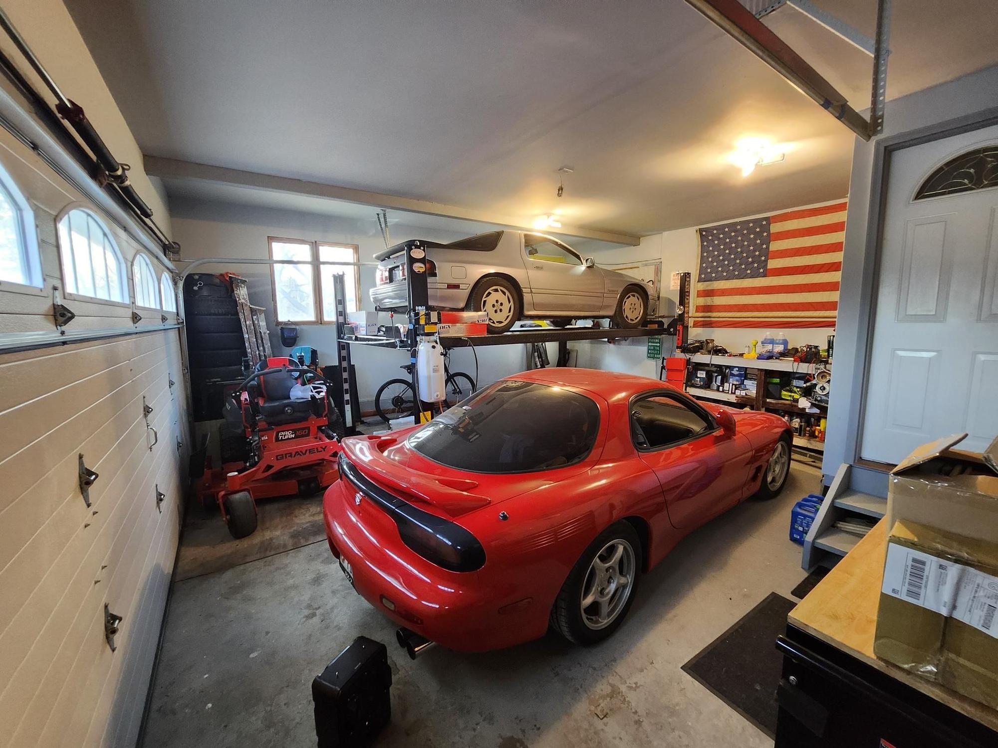 Garage slowly coming together while I work under the FC.