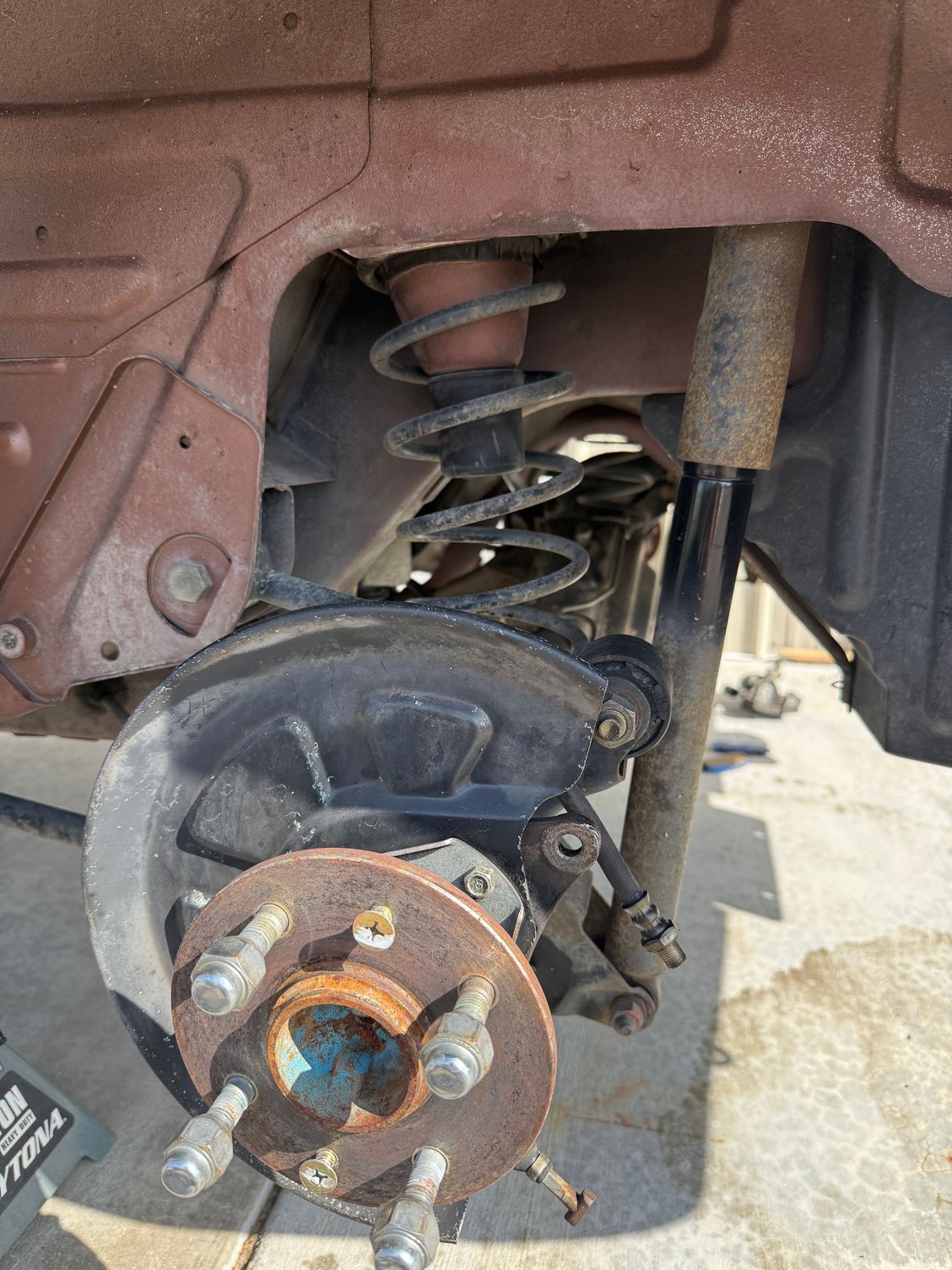 Calipers removed. The underside of the car looks pretty good.