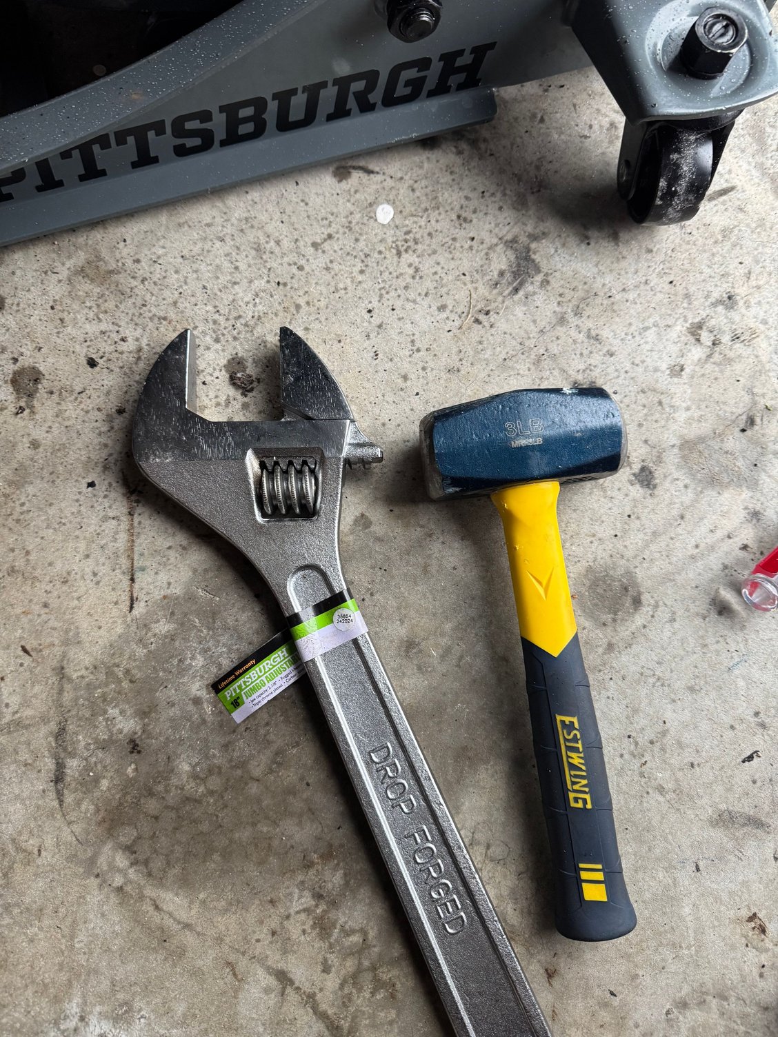 A bit *** wrench, WD-40, a 3lbs mallet, and some hearty elbow grease worked for me.