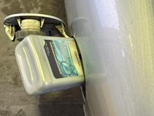 200 ml of Idemitsu going in.....not very scientific measurement (I have an OMP).