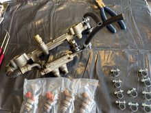 This is how my injectors came back from boost lab with replaced orings. I placed them in the fuel rails and hooked all lines up. I have the feed from the pump going to fuel pulsation dampener and the line from the regulator returning to the tank. 
