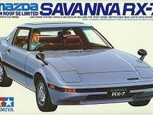 ... and the EXACT same car as a Tamiya kit, with rotor mags, steel sunroof, electric hockeystick mirrors and all!!!!!