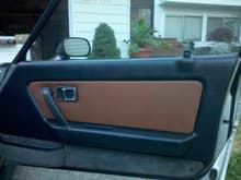 Got both doors done up finally.  Once I re-do the carpet I'll do the bottoms of the door panels to match.