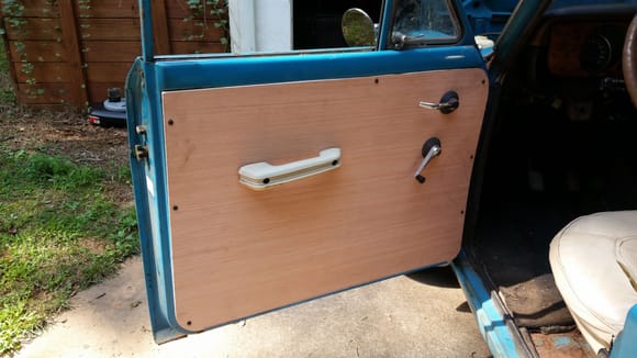 Was a little bored and made some temporary wooden door panels.