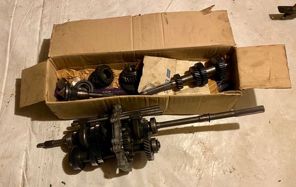 Miata gear-set (in box) & FB transmission internals with Mazda 626 5th gear 