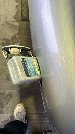 200 ml of Idemitsu going in.....not very scientific measurement (I have an OMP).