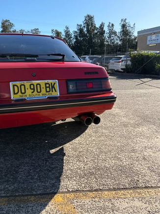 Twin stock tailpipes.