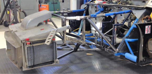 The next step was to take the car to Specialty Engineering in Delta , BC. They are a race shop specializing in roadracing but able to work on anything you can dream up. Their hand built in house tube frame chassis have won several SCCA National championships. While the car was there I had them clean up the rear suspension , add the electric power steering, and set the bump steer. The crashbox was set at a slight angle to increase downforce.