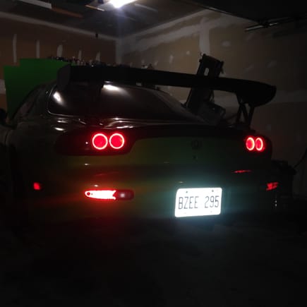 Late night spoiler install using the stock hole so it can be removed easily. Taillight modification with Yellow turn rings as well came out quite nice. This is the second pair I have done now.