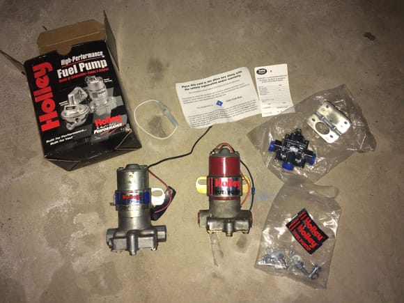 red and blue fuel pump, new never used holley fpr. don't recall the specs on the fpr though