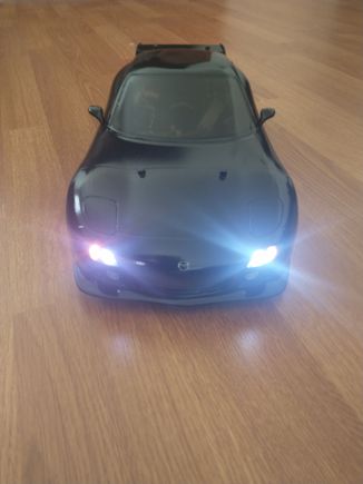 Front view, lights ON. Hard to see here but the amber turn signals are washed out by brighter white LED driving lights