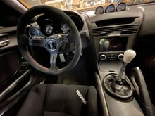 Double gauge pod over steering column for AFR/Boost and Lotek cluster with oil temp, pressure and water temp. Double din, nardi and CAE shifter.