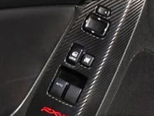 Carbon fiber wrapped window switch panels