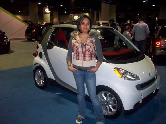 Me at the Philly Auto Show 2.7.09... I HAD to take a pik with the Smart Car!!