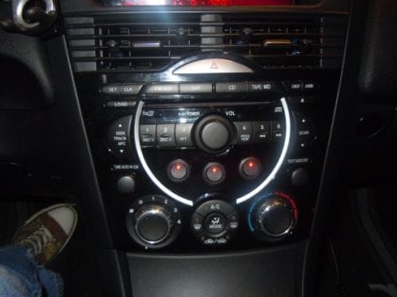 Custom Switches.  (From Left to Right) GPS and Radar, Subwoofer amp, Dual 12 volt outlet in passanger footwell.