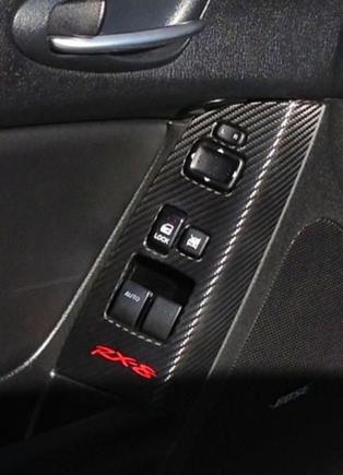 Carbon fiber wrapped window switch panels