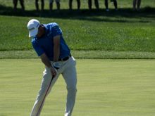 Ryan Palmer (I think).  Ball just off the club.  