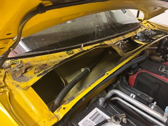 Took the wipers and cowl off to make valve cover removal easier. Good opportunity to clean the grime. Before...