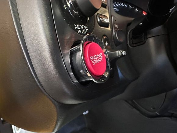 While holding down that metal tab pretty hard, the button popped out without much pressure. 