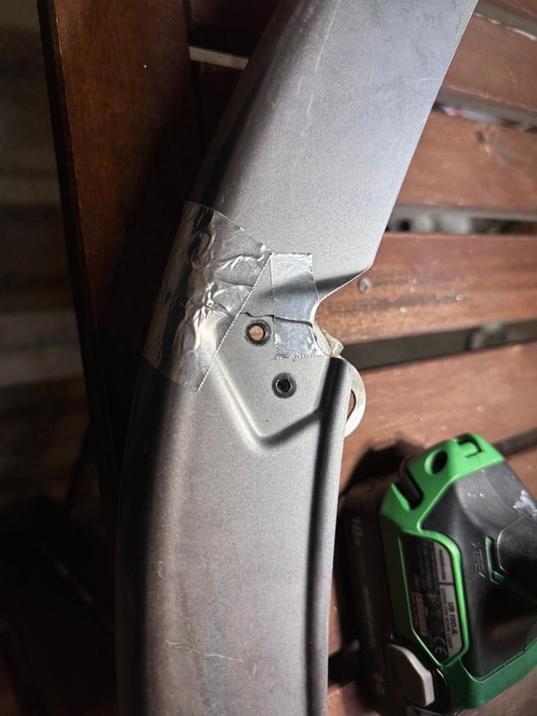 Put some foil tape to reinforce the crack. Ended up drilling out the rivets to see how close the crack was to the mounting area. 