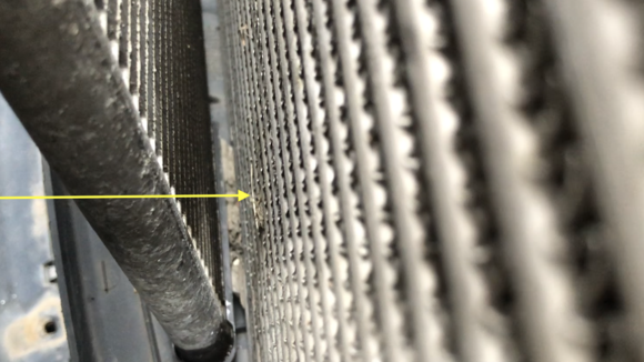 This looks like the hole that is leaking the coolant.