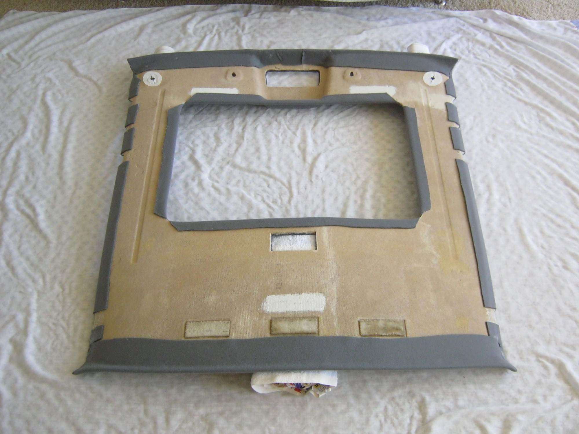 This is the back of the finished headliner. It shows how to fold the fabric on the back. 