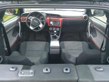 Red interior trim with red pin striping down doors and rear plastics