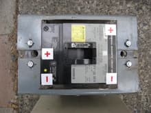 main circuit breaker,  e.g. the &quot;oh sh*t&quot; switch.  Probably came from a large computer or telephone exchange battery backup system.  Mounted on tunnel centered between all four seat positions so all passengers can reach it.