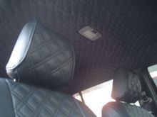 Clazzio quilted seat covers and diamond quilted headliner.
