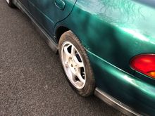 Surface rust above rear passenger's side arch