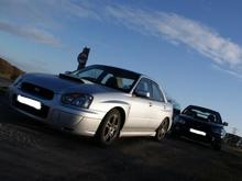 With the front foglight covers on, out for a drive with my mate and his WRX.