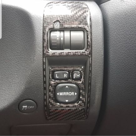 Carbon fiber wrapped mirror controls. 